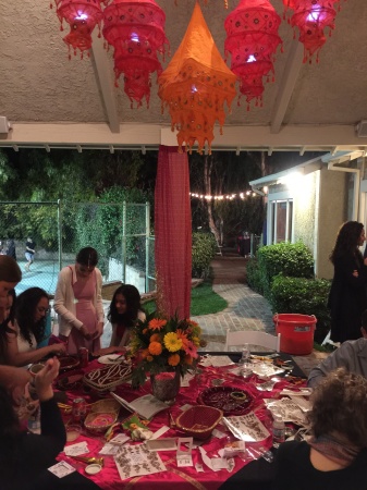 girlie girl table with henna tattos, nose rings, bracelets etc.